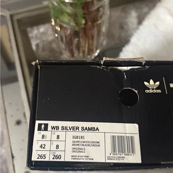 Adidas Women's Silver Sneakers screaming attention. Fly for real